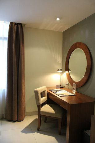 Imagen de la habitación del Hotel Anggrek Shopping Hotel. Foto 14