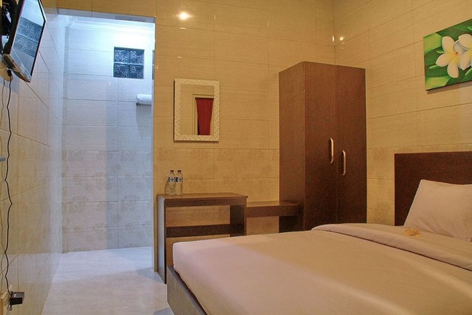 Imagen de la habitación del Hotel Angkul Angkul Beach In Kuta. Foto 5