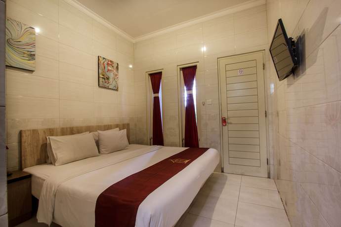 Imagen de la habitación del Hotel Angkul Angkul Beach In Kuta. Foto 9