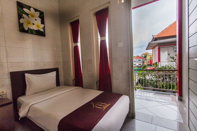 Imagen de la habitación del Hotel Angkul Angkul Beach In Kuta. Foto 10