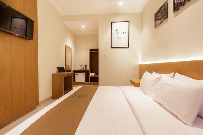 Imagen de la habitación del Hotel Angkul Angkul Segara Beach Kuta. Foto 15