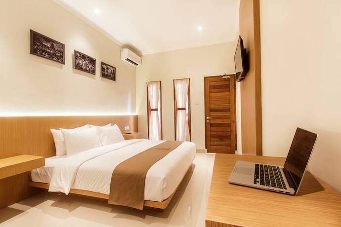 Imagen de la habitación del Hotel Angkul Angkul Segara Beach Kuta. Foto 16