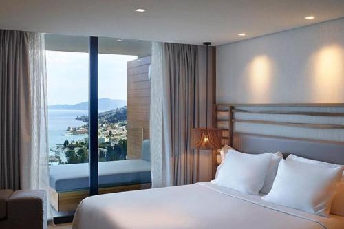 Imagen de la habitación del Hotel Angsana Corfu Resort and Spa. Foto 17