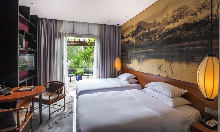 Imagen de la habitación del Hotel Angsana Hangzhou. Foto 5