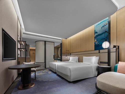 Imagen de la habitación del Hotel Angsana Suzhou Shishan. Foto 7