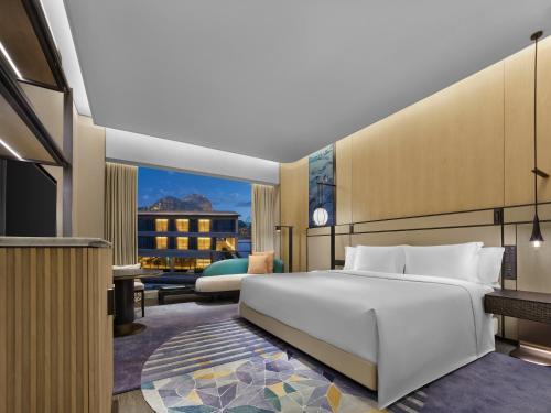 Imagen de la habitación del Hotel Angsana Suzhou Shishan. Foto 9