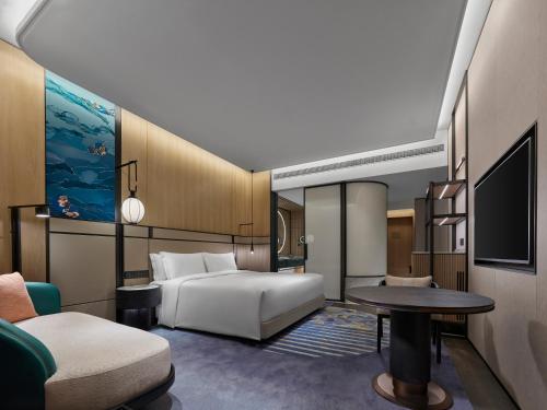 Imagen de la habitación del Hotel Angsana Suzhou Shishan. Foto 10