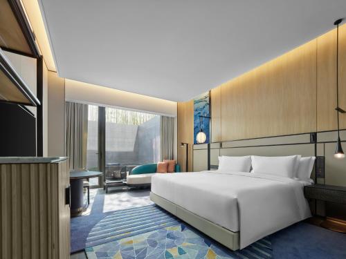Imagen de la habitación del Hotel Angsana Suzhou Shishan. Foto 12