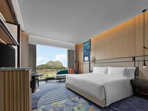 Imagen de la habitación del Hotel Angsana Suzhou Shishan. Foto 16