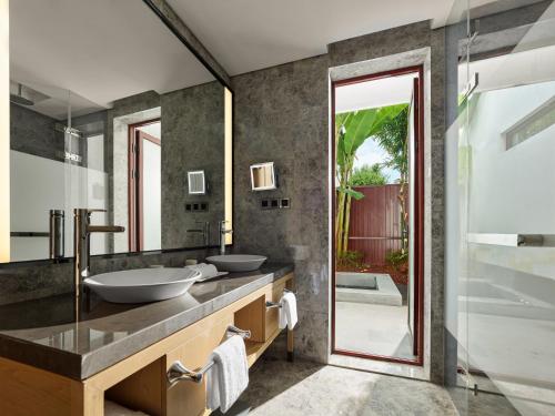 Imagen de la habitación del Hotel Angsana Tengchong. Foto 11