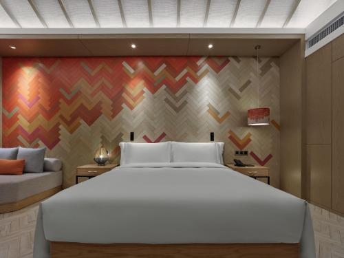 Imagen de la habitación del Hotel Angsana Tengchong. Foto 14