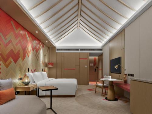 Imagen de la habitación del Hotel Angsana Tengchong. Foto 15