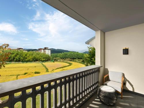 Imagen de la habitación del Hotel Angsana Tengchong. Foto 16