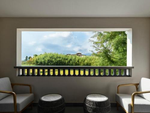 Imagen de la habitación del Hotel Angsana Tengchong. Foto 17