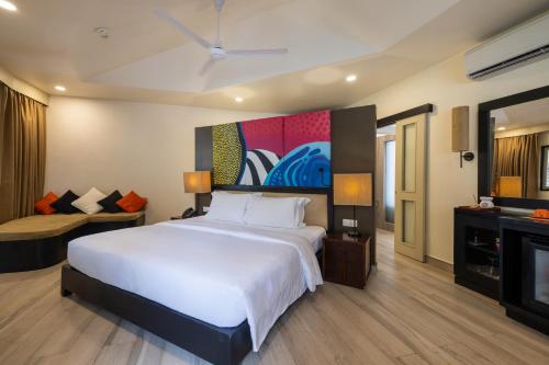 Imagen de la habitación del Hotel Angsana Velavaru. Foto 16