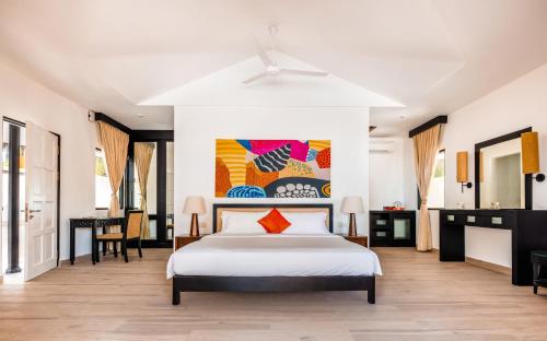 Imagen de la habitación del Hotel Angsana Velavaru. Foto 20