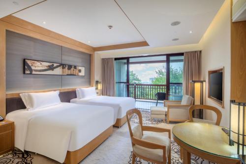 Imagen de la habitación del Hotel Angsana Xi'an Lintong. Foto 14