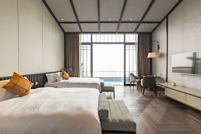 Imagen de la habitación del Hotel Angsana Zhuhai Phoenix Bay. Foto 6