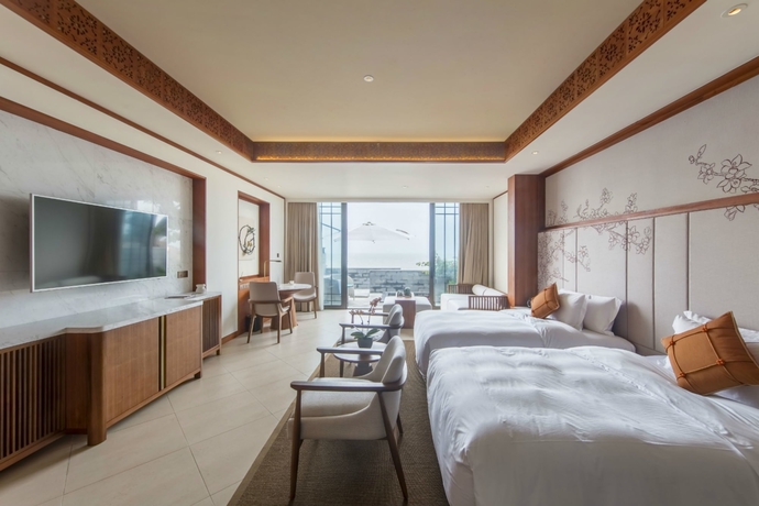 Imagen de la habitación del Hotel Angsana Zhuhai Phoenix Bay. Foto 7