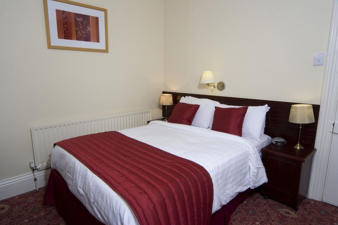 Imagen de la habitación del Hotel Angus. Foto 9