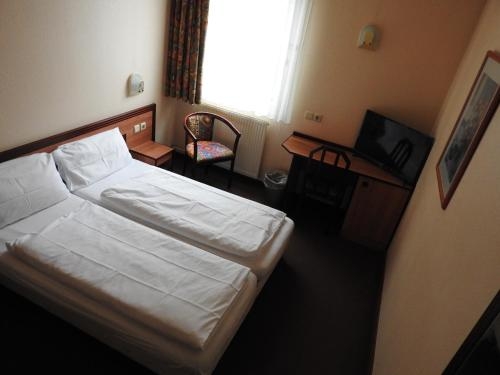 Imagen de la habitación del Hotel Anhalt. Foto 7