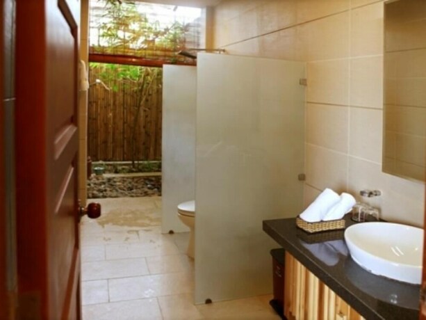 Imagen de la habitación del Hotel Aniise Villa Resort. Foto 17