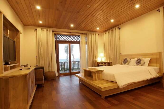 Imagen de la habitación del Hotel Aniise Villa Resort. Foto 21