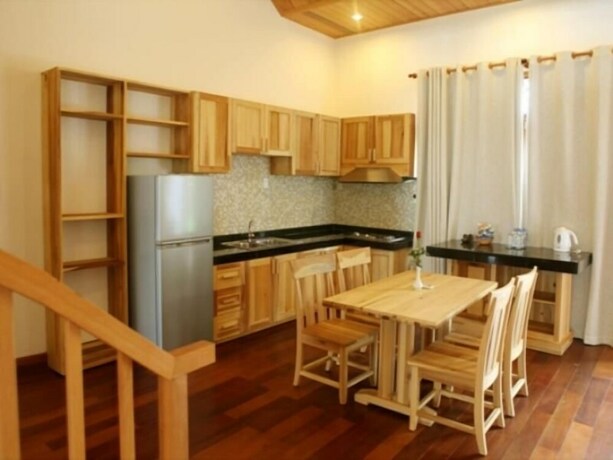 Imagen de la habitación del Hotel Aniise Villa Resort. Foto 22