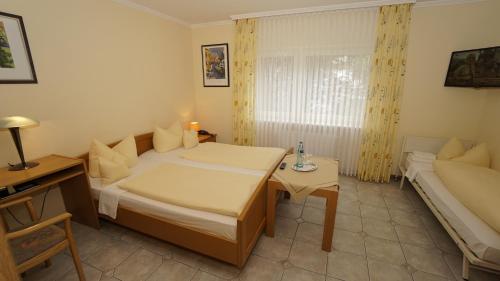 Imagen de la habitación del Hotel Anika, Neuenburg am Rhein. Foto 9
