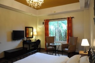 Imagen de la habitación del Hotel Anisabel Suites. Foto 12
