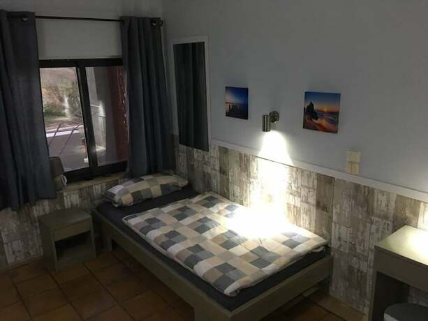 Imagen de la habitación del Hotel Anissaras Beach Apartments. Foto 12