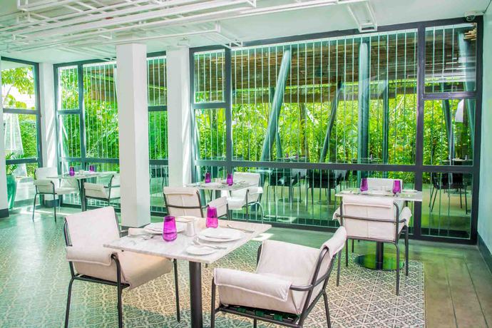 Imagen del bar/restaurante del Hotel Anjali By Syphon. Foto 2