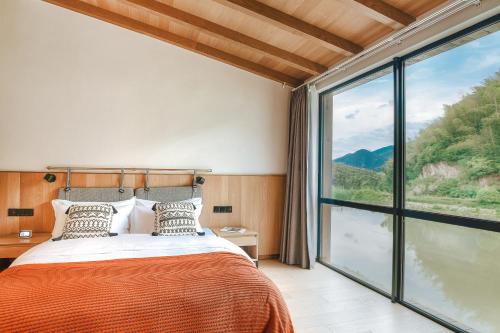 Imagen de la habitación del Hotel Anji Shanchuan Design Homestay. Foto 13