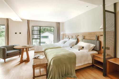 Imagen de la habitación del Hotel Anji Shanchuan Design Homestay. Foto 15