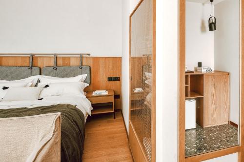 Imagen de la habitación del Hotel Anji Shanchuan Design Homestay. Foto 18