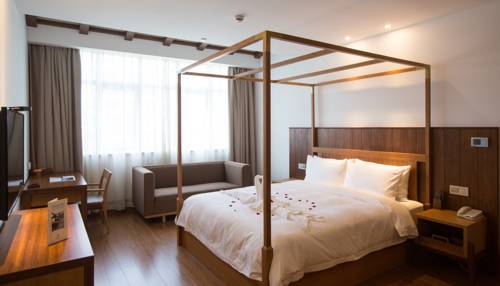 Imagen de la habitación del Hotel Anji Spring Alpha Resort. Foto 4