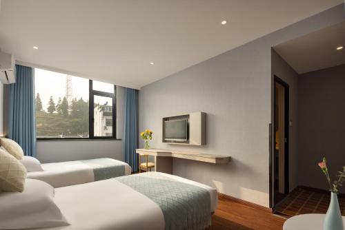 Imagen de la habitación del Hotel Anlan Shangrao Wuyuan Cultural Plaza. Foto 17