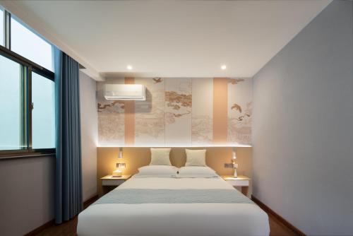 Imagen de la habitación del Hotel Anlan Shangrao Wuyuan Cultural Plaza. Foto 18