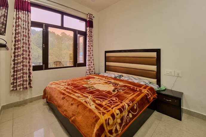 Imagen de la habitación del Hotel Anmol Dalhousie. Foto 2