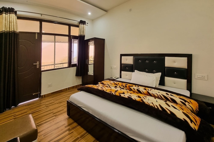 Imagen de la habitación del Hotel Anmol Dalhousie. Foto 6