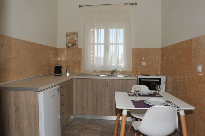 Imagen de la habitación del Hotel Anna Apartments. Foto 15