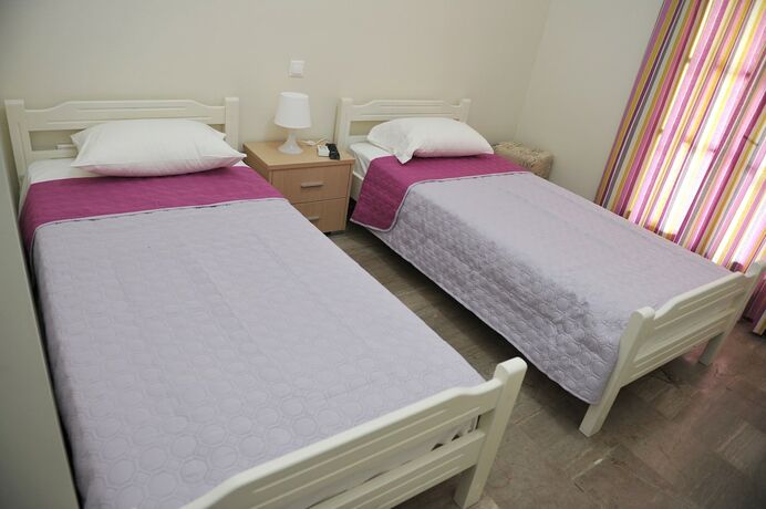 Imagen de la habitación del Hotel Anna Apartments. Foto 17