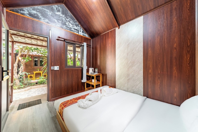 Imagen de la habitación del Hotel Anna Bungalow Vientiane. Foto 12