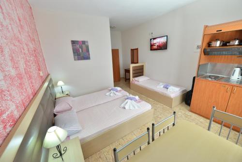 Imagen de la habitación del Hotel Anna Christina Apartments. Foto 7