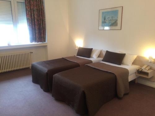 Imagen de la habitación del Hotel Anne De Beaujeu. Foto 5