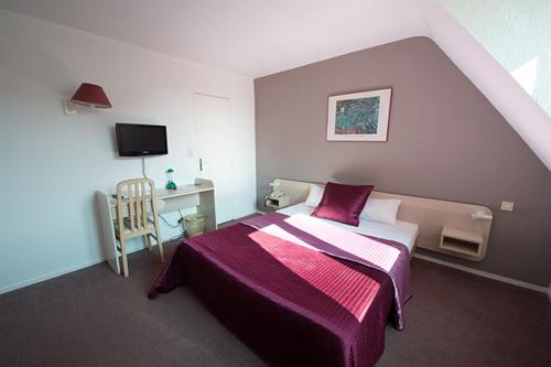Imagen de la habitación del Hotel Anne De Beaujeu. Foto 10