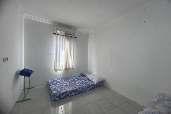 Imagen de la habitación del Hotel Annet Homestay. Foto 7