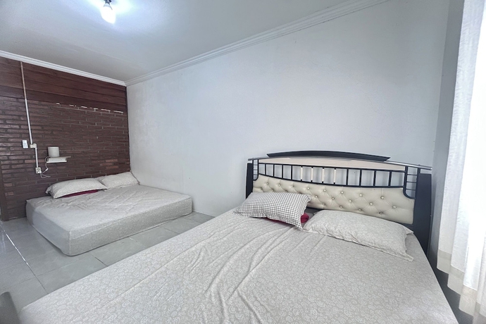 Imagen de la habitación del Hotel Annet Homestay. Foto 8