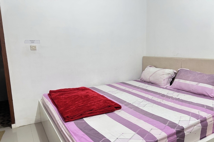 Imagen de la habitación del Hotel Annet Homestay. Foto 12