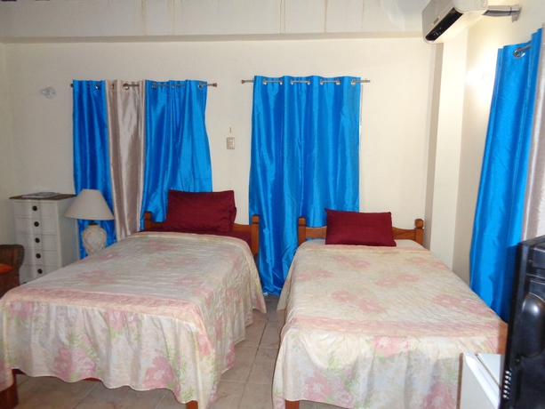 Imagen de la habitación del Hotel Ann's Villa. Foto 7